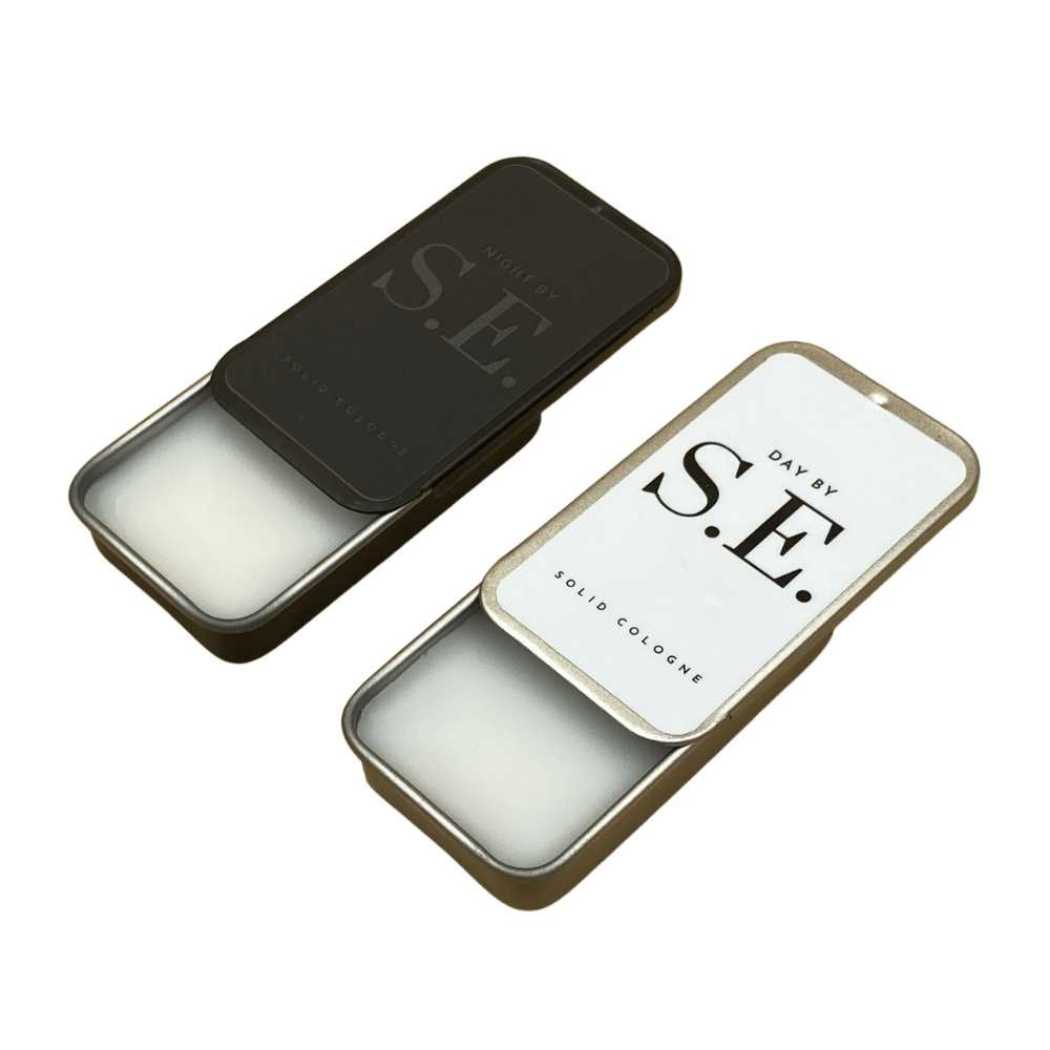 Solid cologne tins: Day by S.E. and NIGHT by S.E., two colors