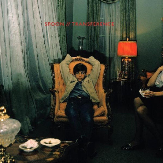 Album cover artwork with seated woman in dark overalls, red title on green drape