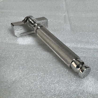 SteelMaster Razor angled view of chrome head and textured ribbed handle