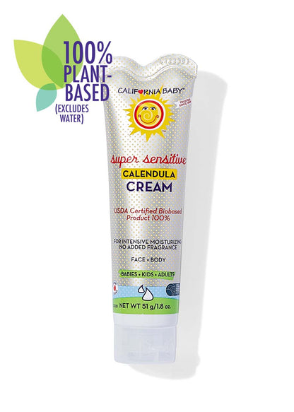 Calendula cream tube with white dotted design and green label band, for face and body