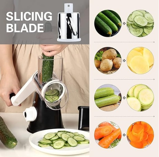 Black and white manual kitchen grater with stainless slicing drum and handle