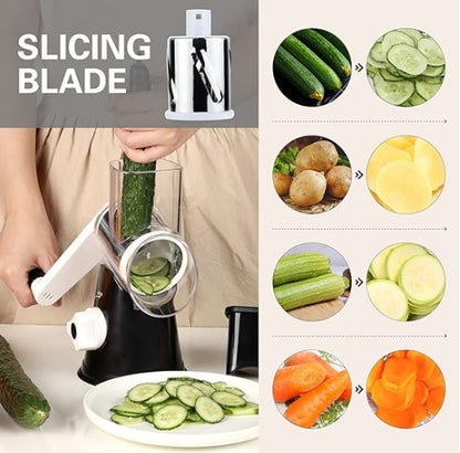 Black and white manual kitchen grater with stainless slicing drum and handle