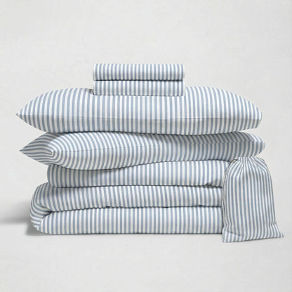Blue and white striped sateen bedding bundle with stacked duvet and pillows