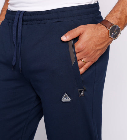 Navy athletic sweatpants close-up of front pocket and drawstring waist