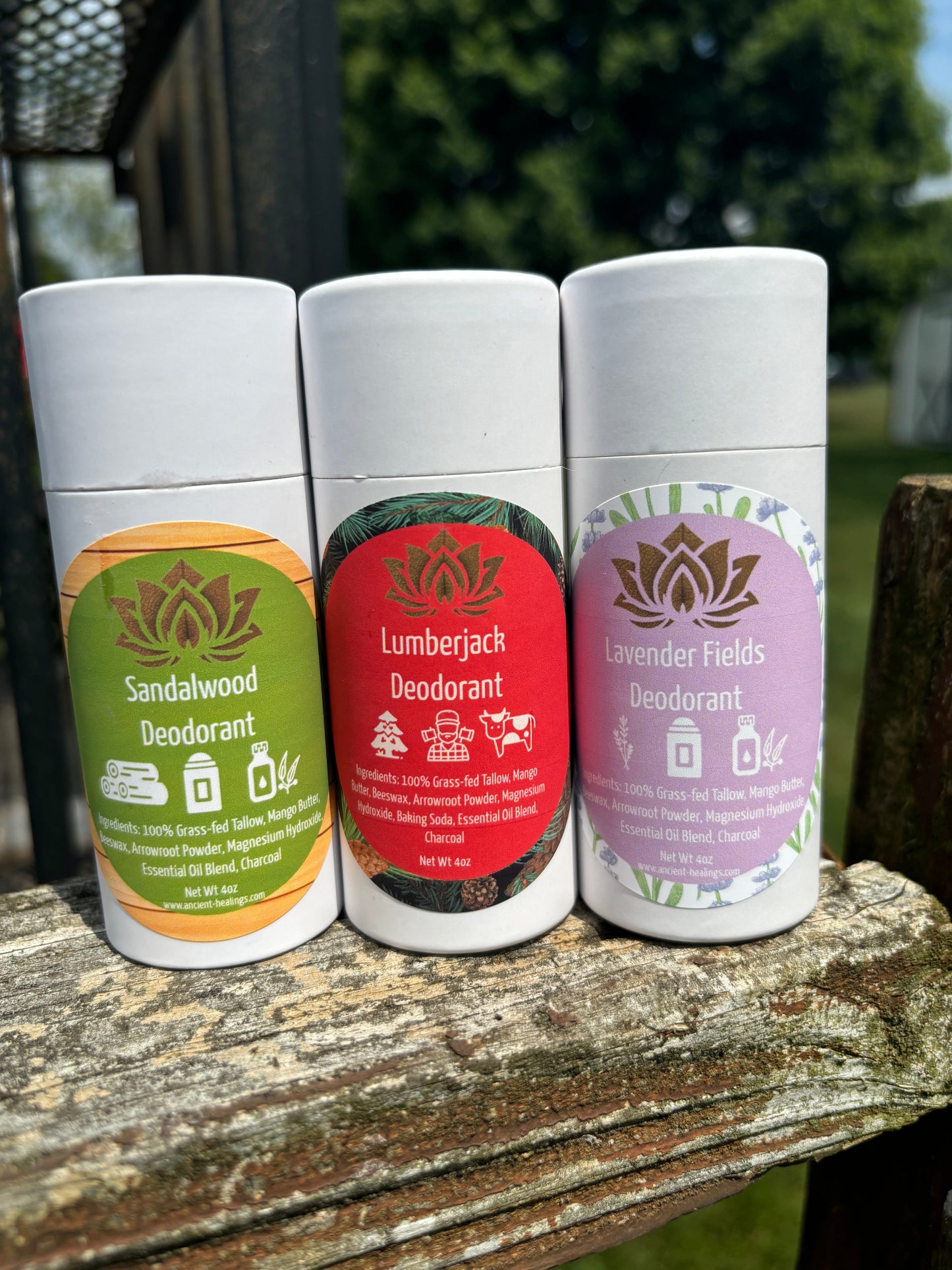 Set of three tallow deodorant sticks: Sandalwood, Lumberjack, and Lavender Fields.