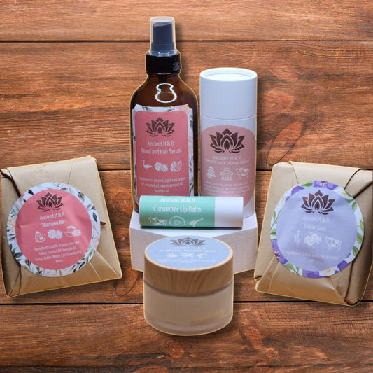Tallow shower care bundle with deodorant bottle, lip balm tube, soap and balm jars