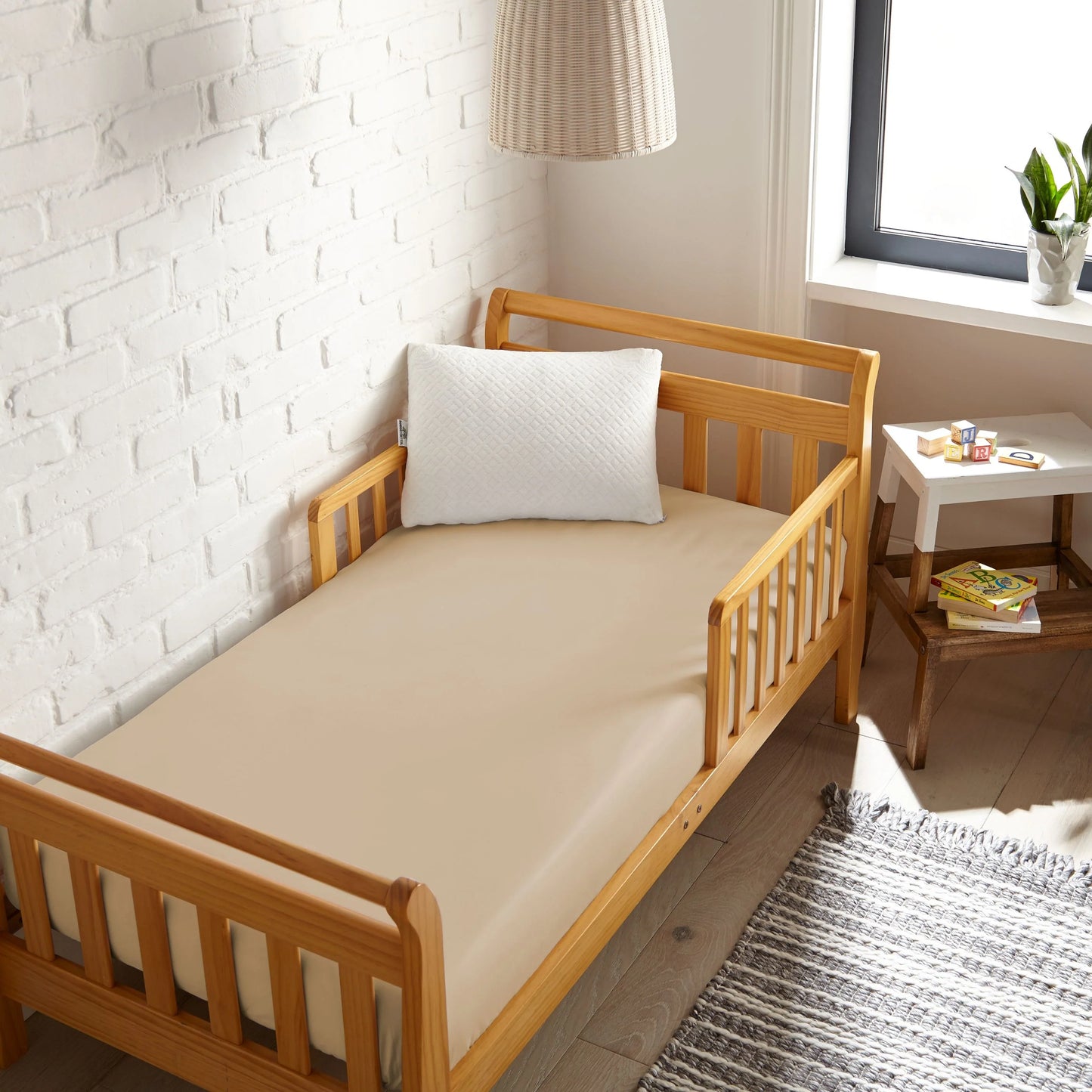 Cooling bamboo crib fitted sheet, white, textured surface on crib mattress