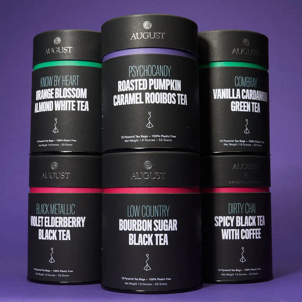 August tea canister set with labeled black, pumpkin, vanilla, and caramel roasted flavors