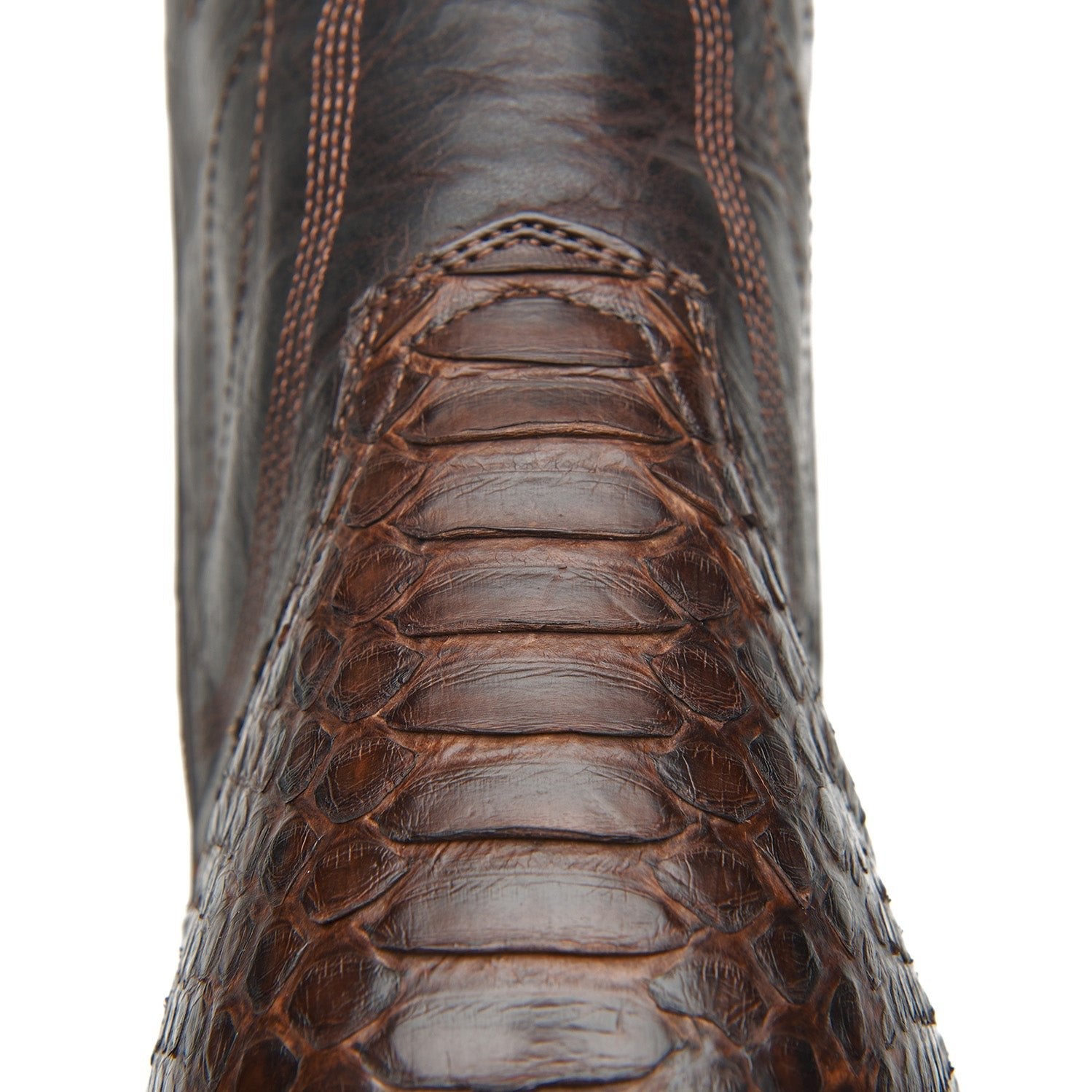 Brown leather cowboy boot outer shaft with scale texture and stacked seam lines