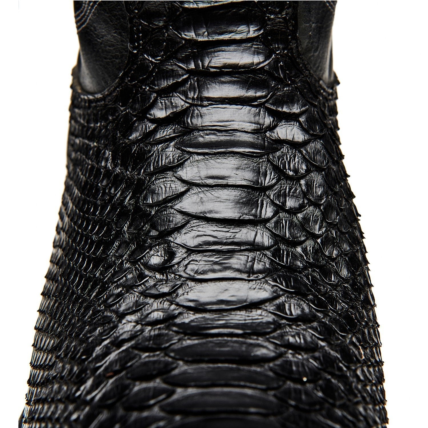 Black cowboy boot with textured crocodile-style leather finish and pointed toe