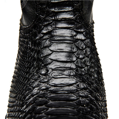 Black cowboy boot with textured crocodile-style leather finish and pointed toe
