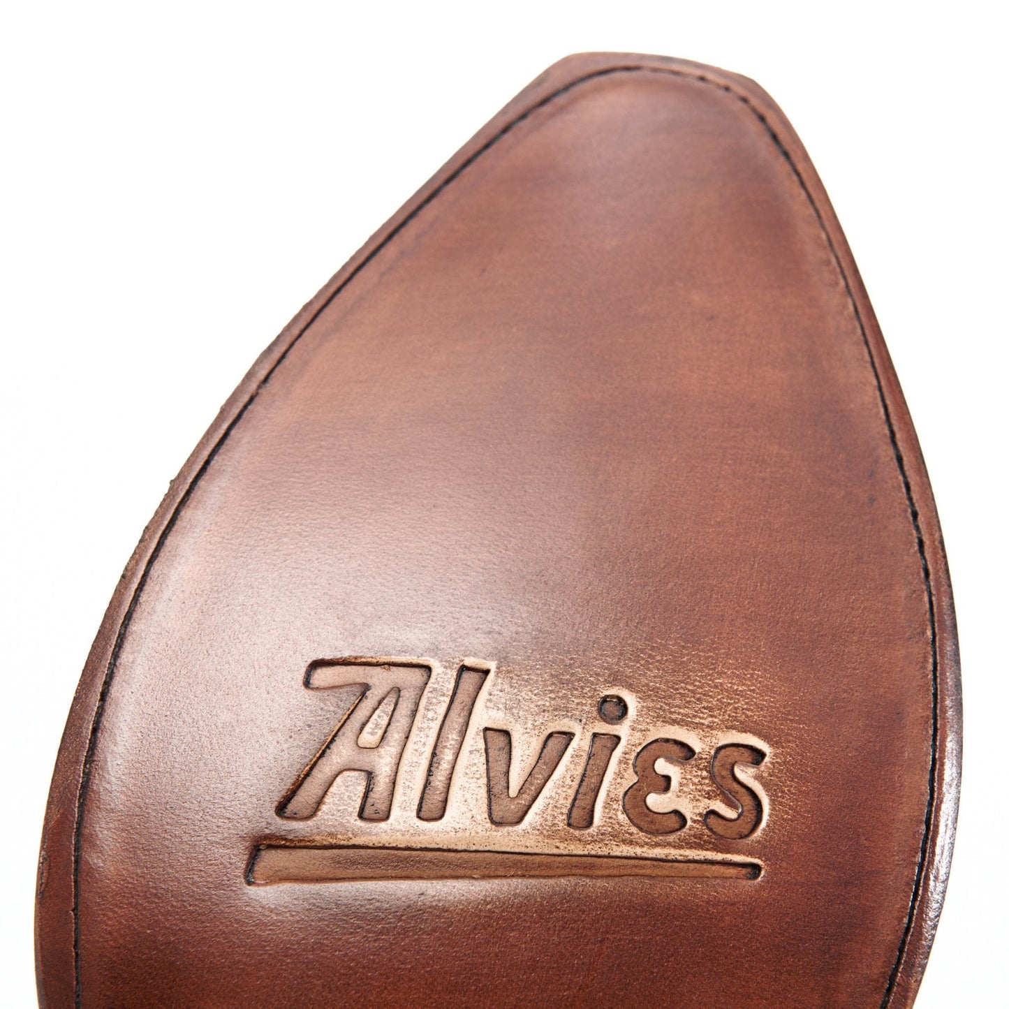 Brown leather boot footbed with embossed 'Allvies' logo.