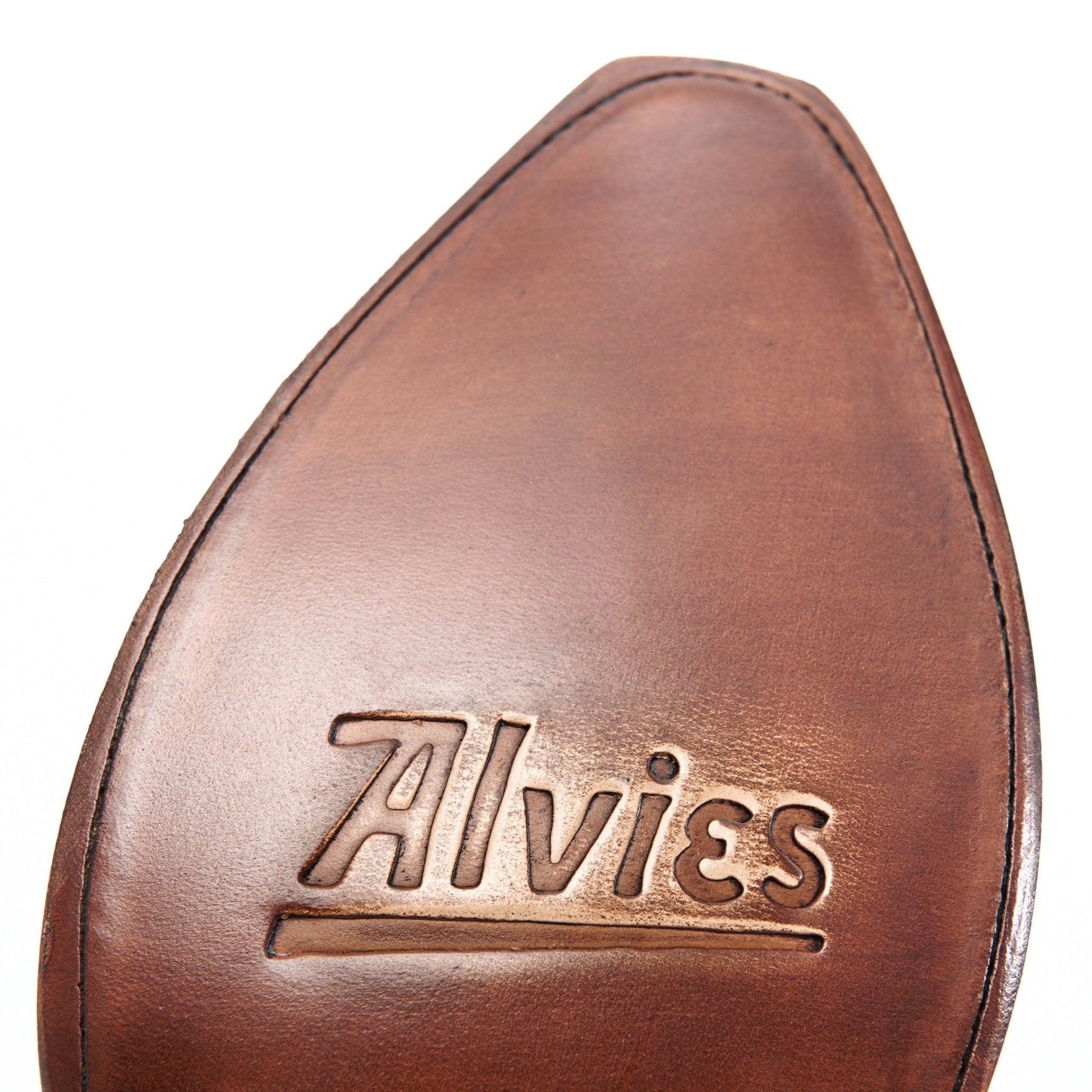 Brown leather boot footbed with embossed 'Allvies' logo.