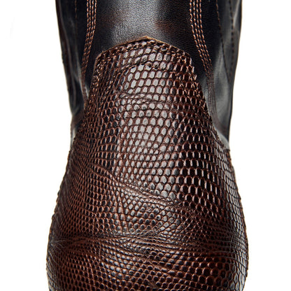 Dark brown cowboy boot shaft with scale-like texture and curved stitching details