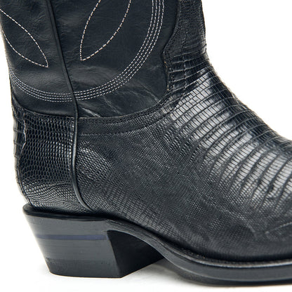 Black cowboy boot heel and side with textured leather and curved stitch accents.