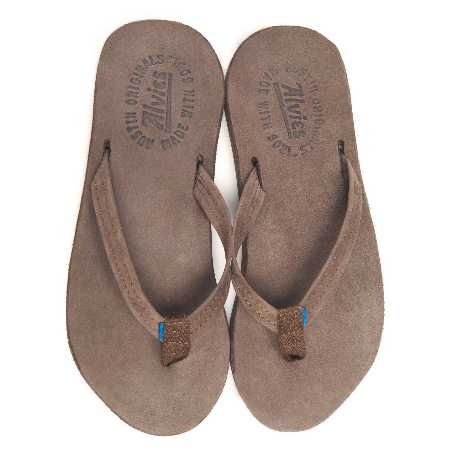 Brown suede flip-flops showing printed insoles with blue toe posts