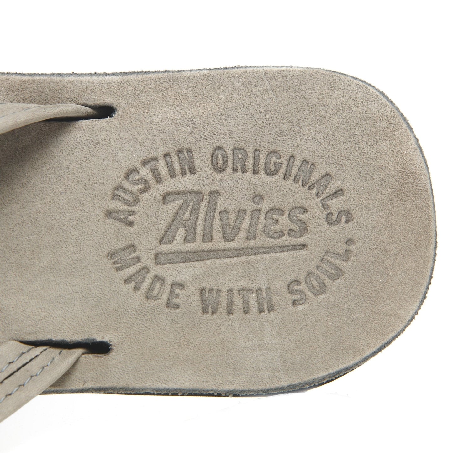 Flip-flop footbed with Austin Originals logo and 'Made with soul' lettering.