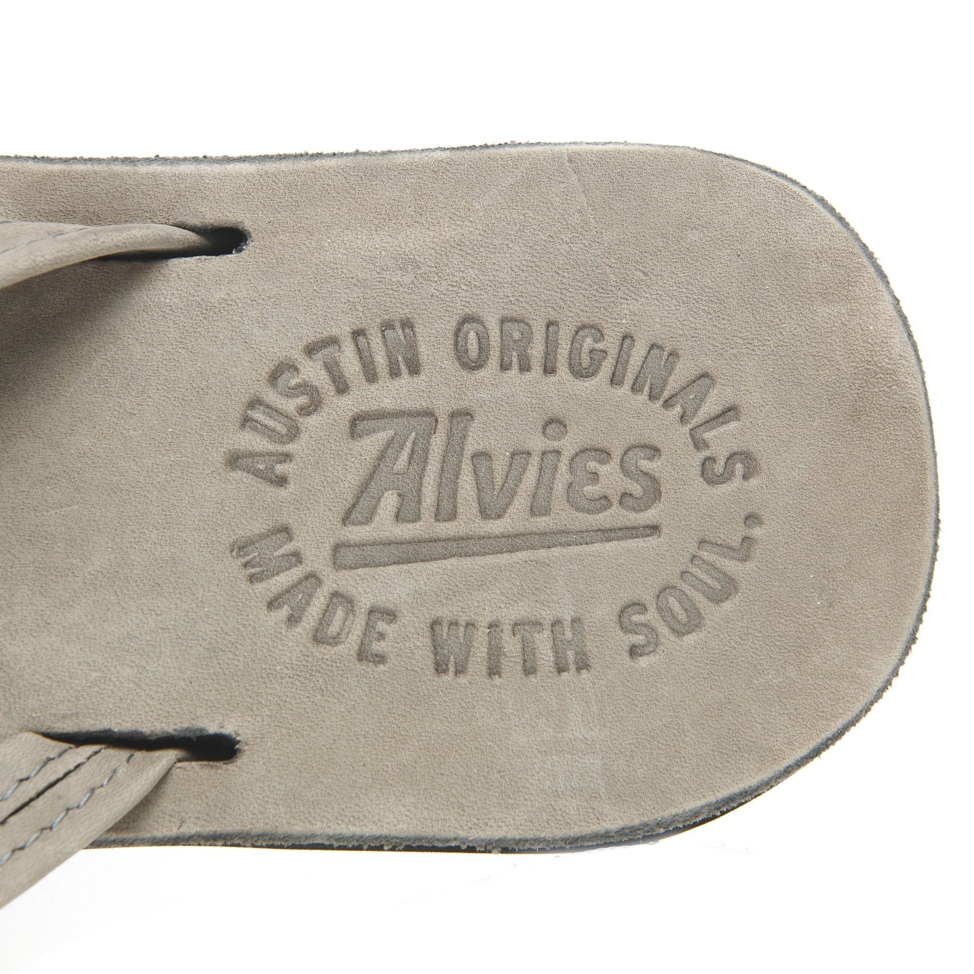 Flip-flop footbed with Austin Originals logo and 'Made with soul' lettering.