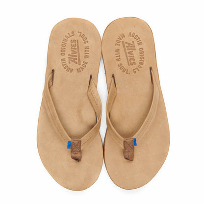 Tan flip-flops with woven thong straps and dark brown sole edges