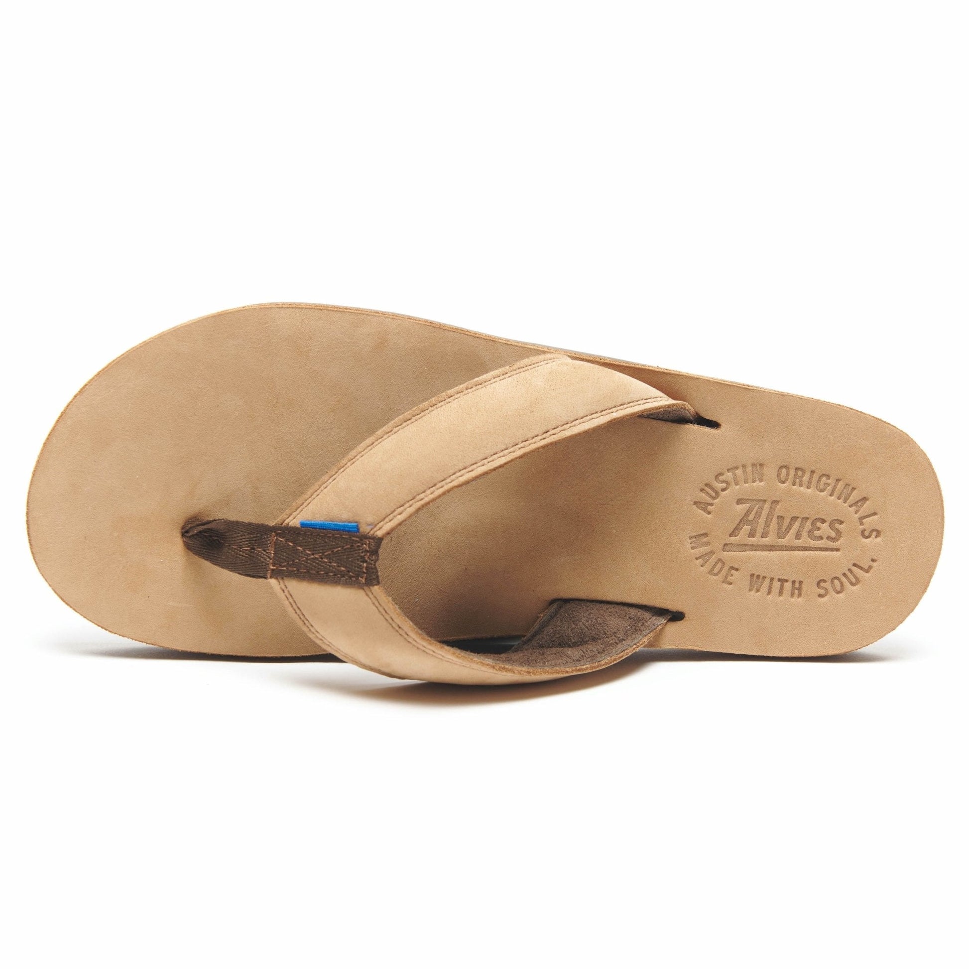 Tan flip-flop sandal with embossed logo on the footbed and brown strap