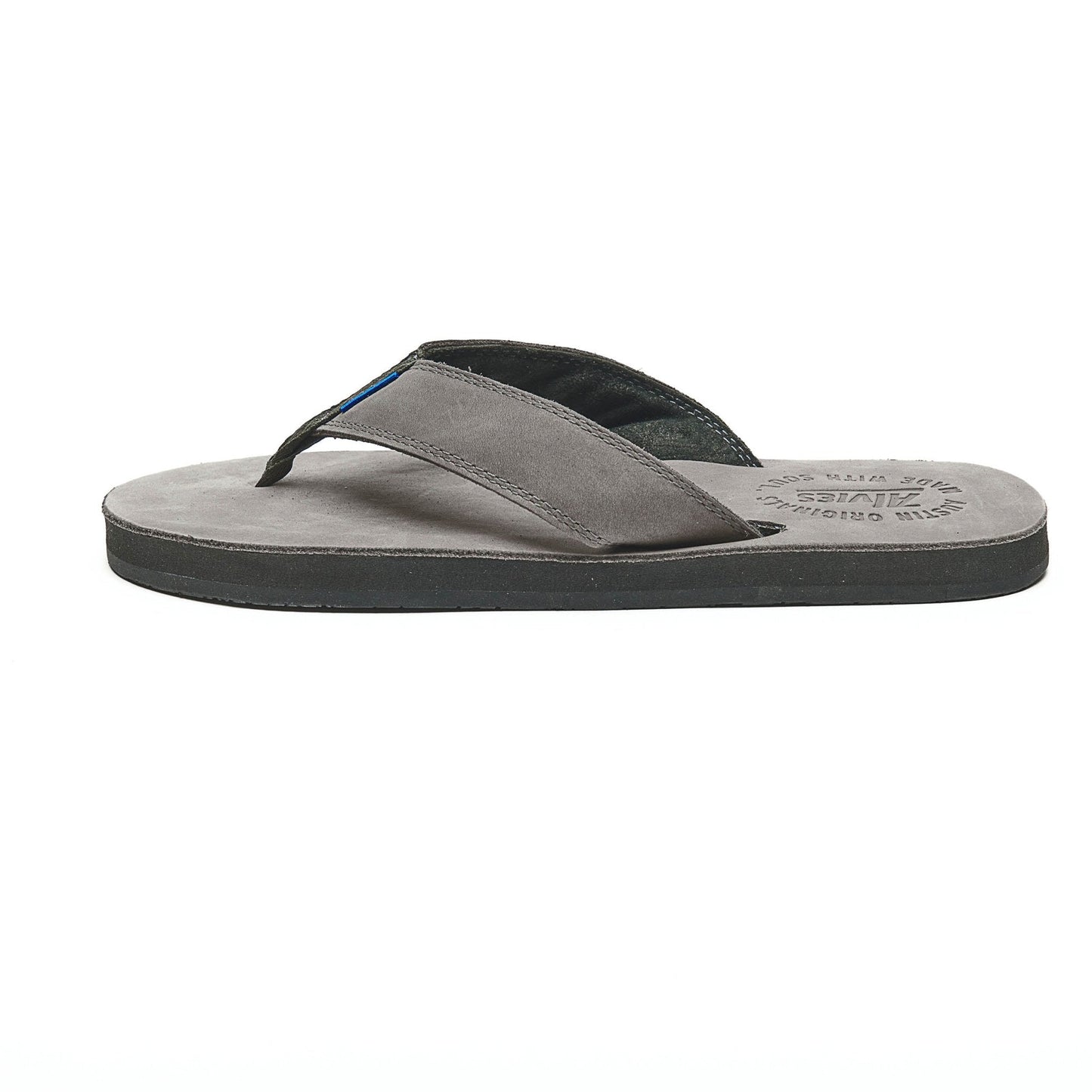 Gray thong sandals with padded top strap and black inner footbed, side view