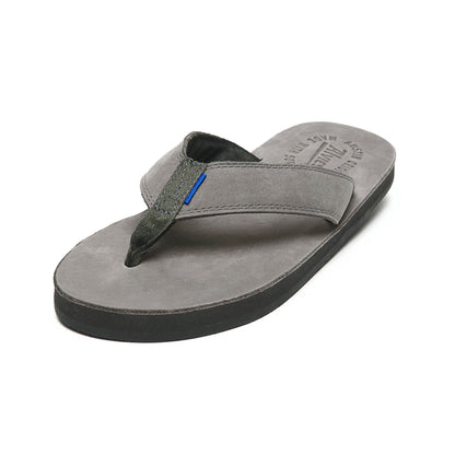 Gray thong sandals with black insole and blue accent detail, front 3/4 view