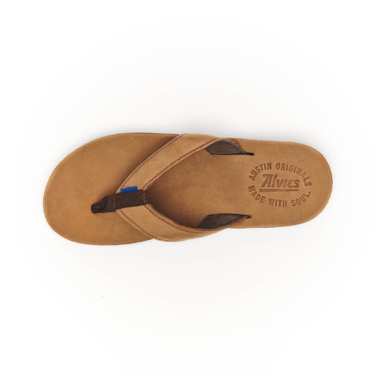 Tan flip-flop sandal showing outsole and logo on footbed