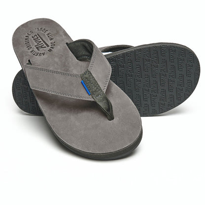Gray flip-flop sandal with gray thong strap and embossed logo on footbed