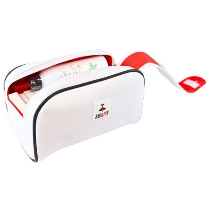 White toiletry bag with red lining, black-trim zipper opening and front logo patch