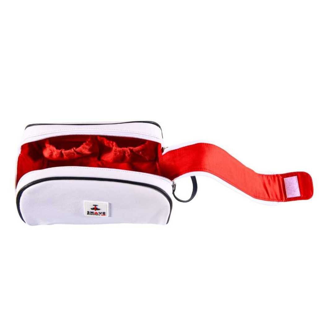 Red toiletry bag with white trim, front logo patch, black zipper and side loop strap