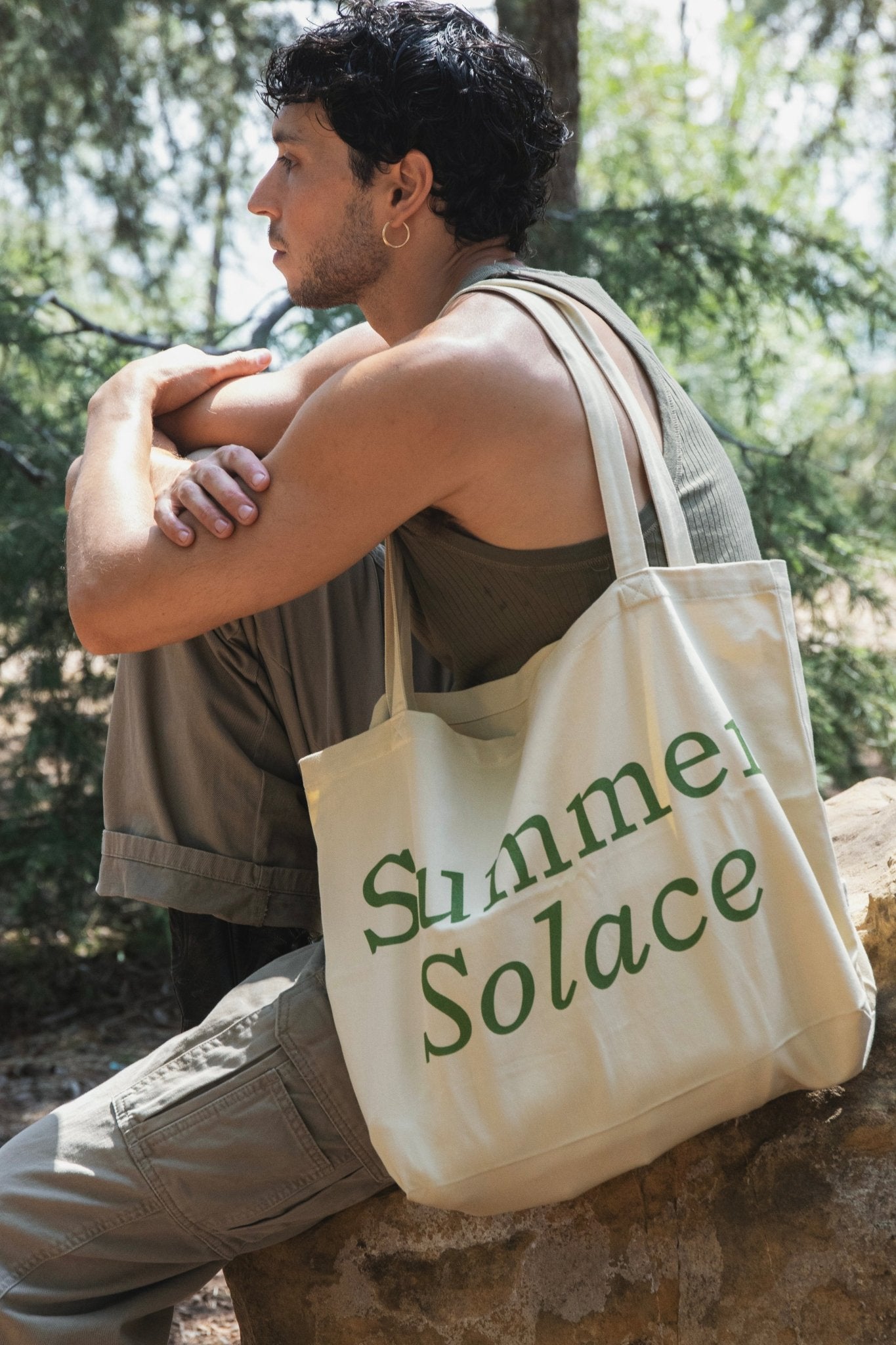 Off-white canvas tote bag with long handles and 'Summer Solace' front text