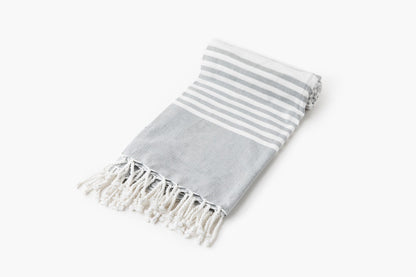 Turkish beach towel, gray with white horizontal stripe and tassel fringe