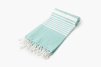 Turkish beach towel, teal with white stripes and tassel fringe
