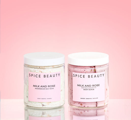 Milk and Rose bath soak and body scrub jars with white lids, two containers
