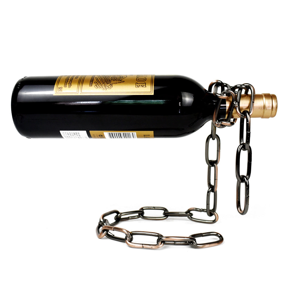 Wine bottle holder with black bottle and bronze chain clamp