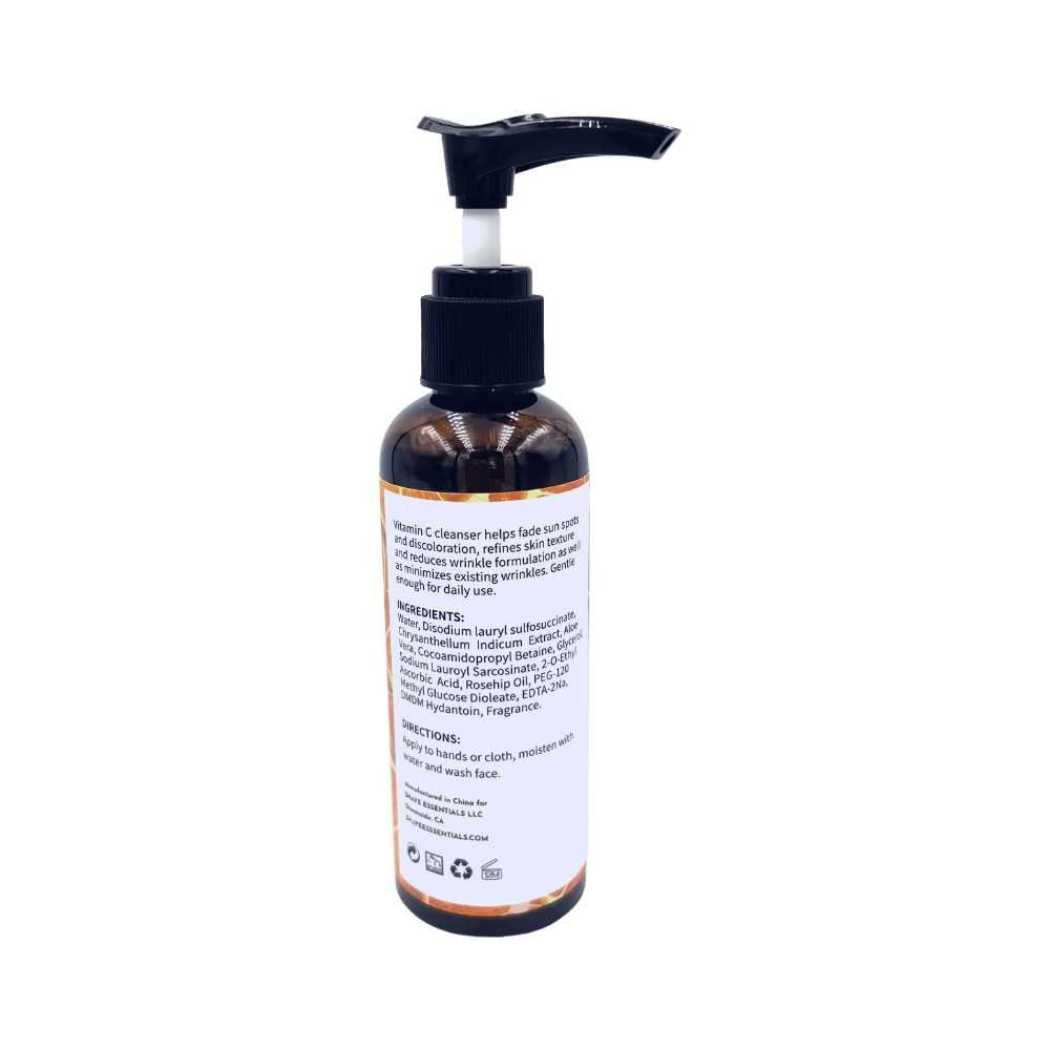 Vitamin C facial cleanser bottle with black pump, back label visible
