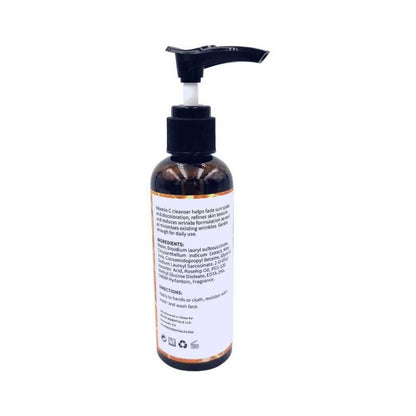Vitamin C facial cleanser bottle with black pump, back label visible