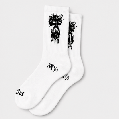 White boot socks with black tree-and-drip graphic, ribbed crew cuffs, pair shown.