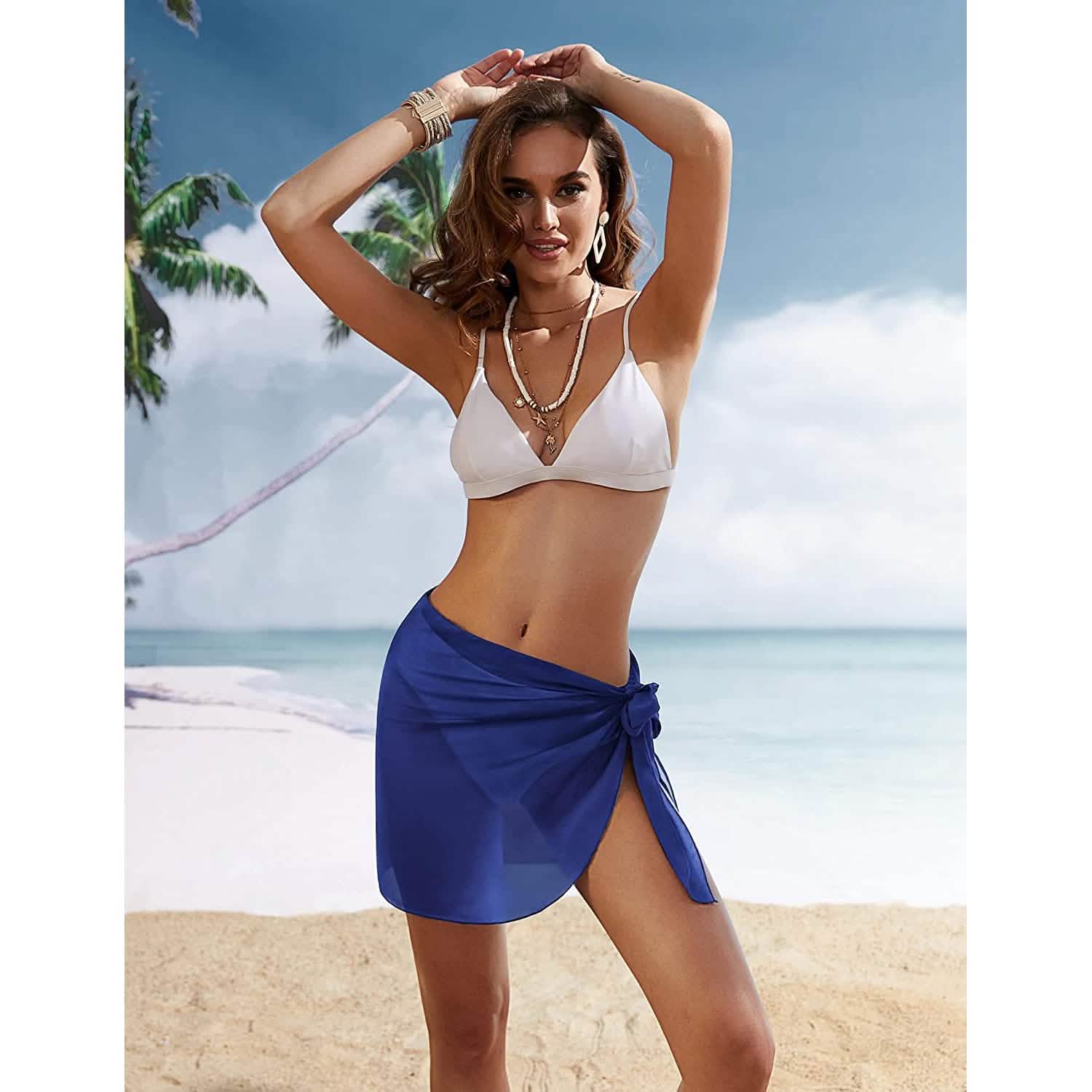 Short sarong beach wrap in deep blue, tied knot at the hip with flowing wrap