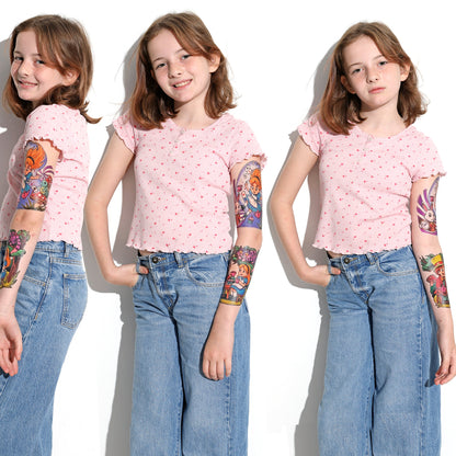 Temporary tattoo sleeve on child’s arm, with wonderland cartoon figures in colorful ink