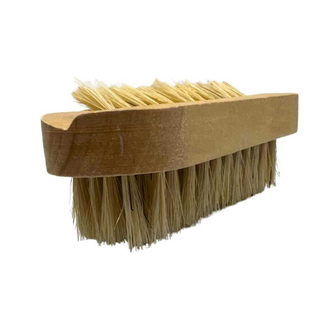 Wooden nail brush with long tan bristles on rectangular wooden base