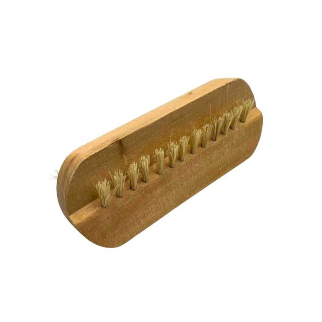 Wooden nail brush side view with tan bristle row in light wooden frame