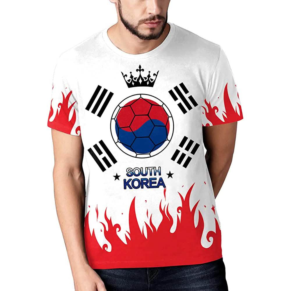 South Korea soccer jersey with black crown graphic, ball, red flame sleeves, and dark blue panel.