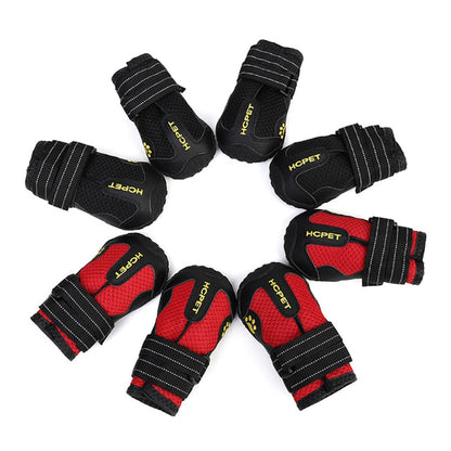 Set of waterproof reflective dog boots in black and red, each with hook-and-loop straps