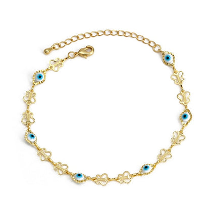 Gold charm bracelet with blue evil-eye charms and ornate link detailing, with clasp