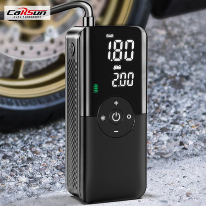 Black portable inflator pump with digital pressure display and control buttons.