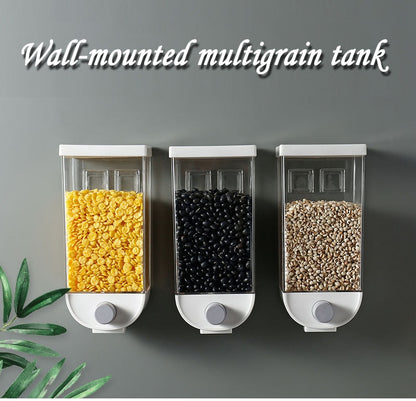 Wall-mounted kitchen sealed grain jars, three clear bins with yellow, dark, and beige kernels