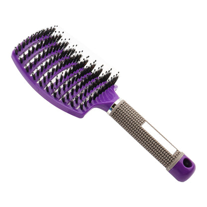 Purple massage hair comb with textured grip handle and dense mixed bristles