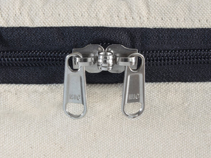 Comforter storage bag zipper pull, two metal sliders on dark fabric track