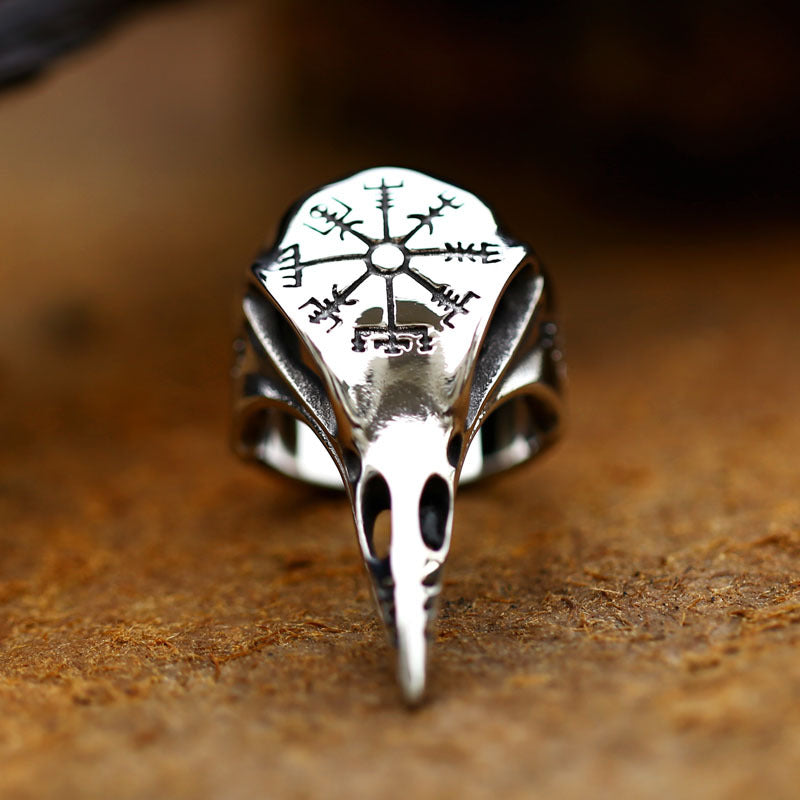 Silver gothic ring with central snowflake emblem and pierced side openings